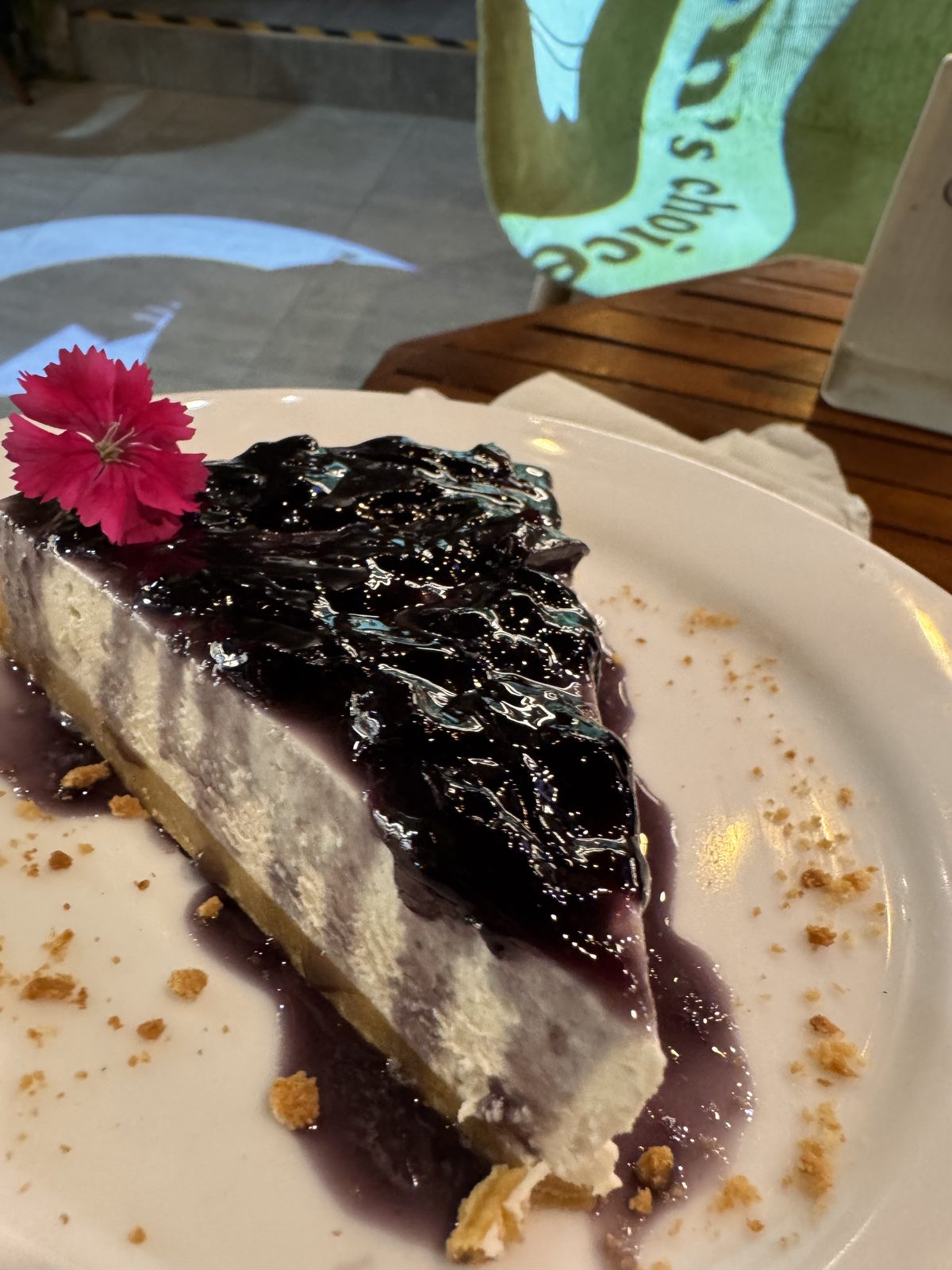 A berry slice with a pink flower