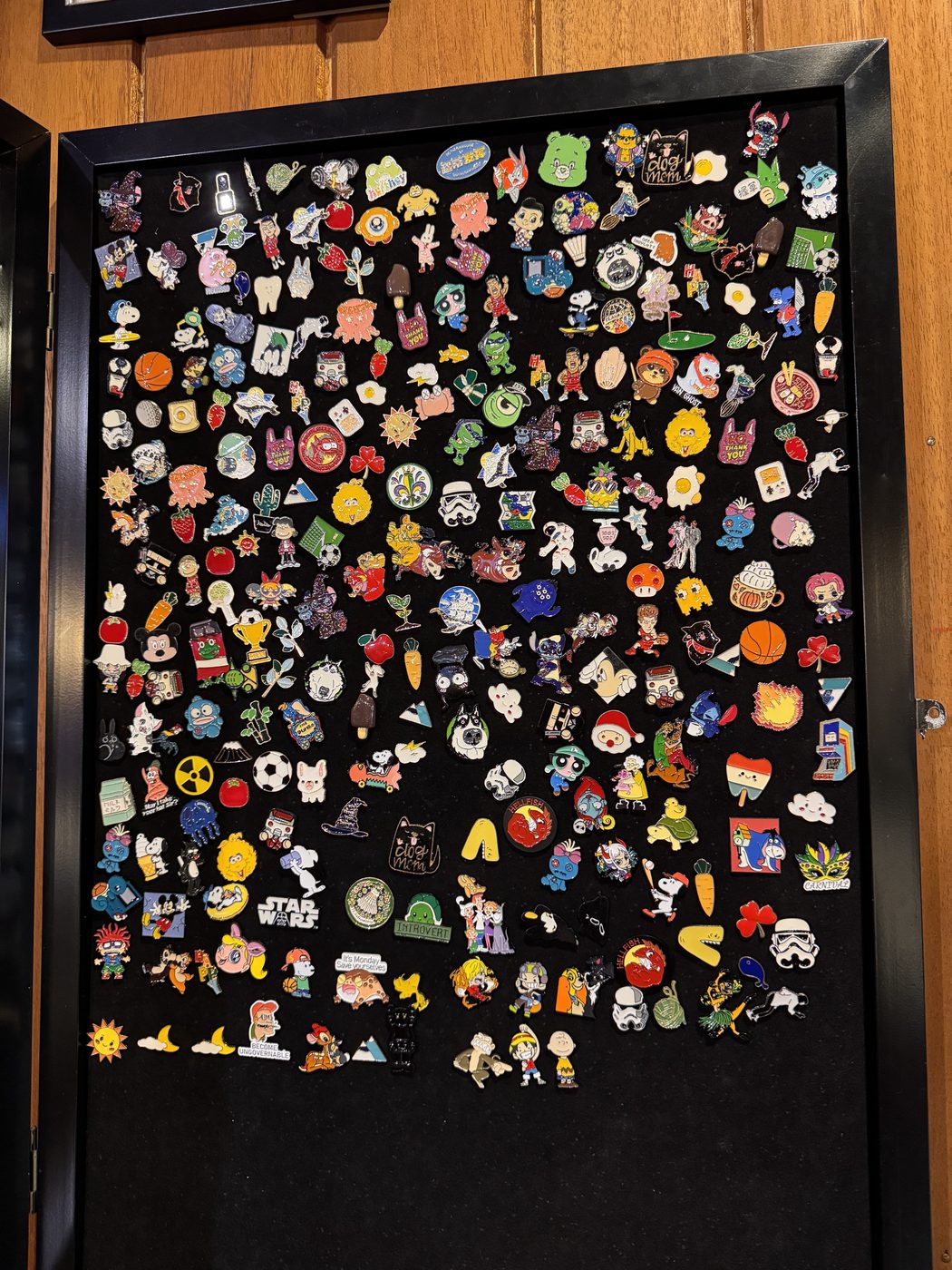 A wall of pop-culture pins